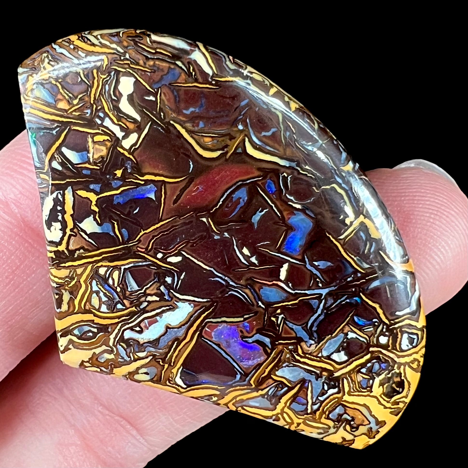 Hotsell A good size freeform shape boulder opal with an unusual colour pattern