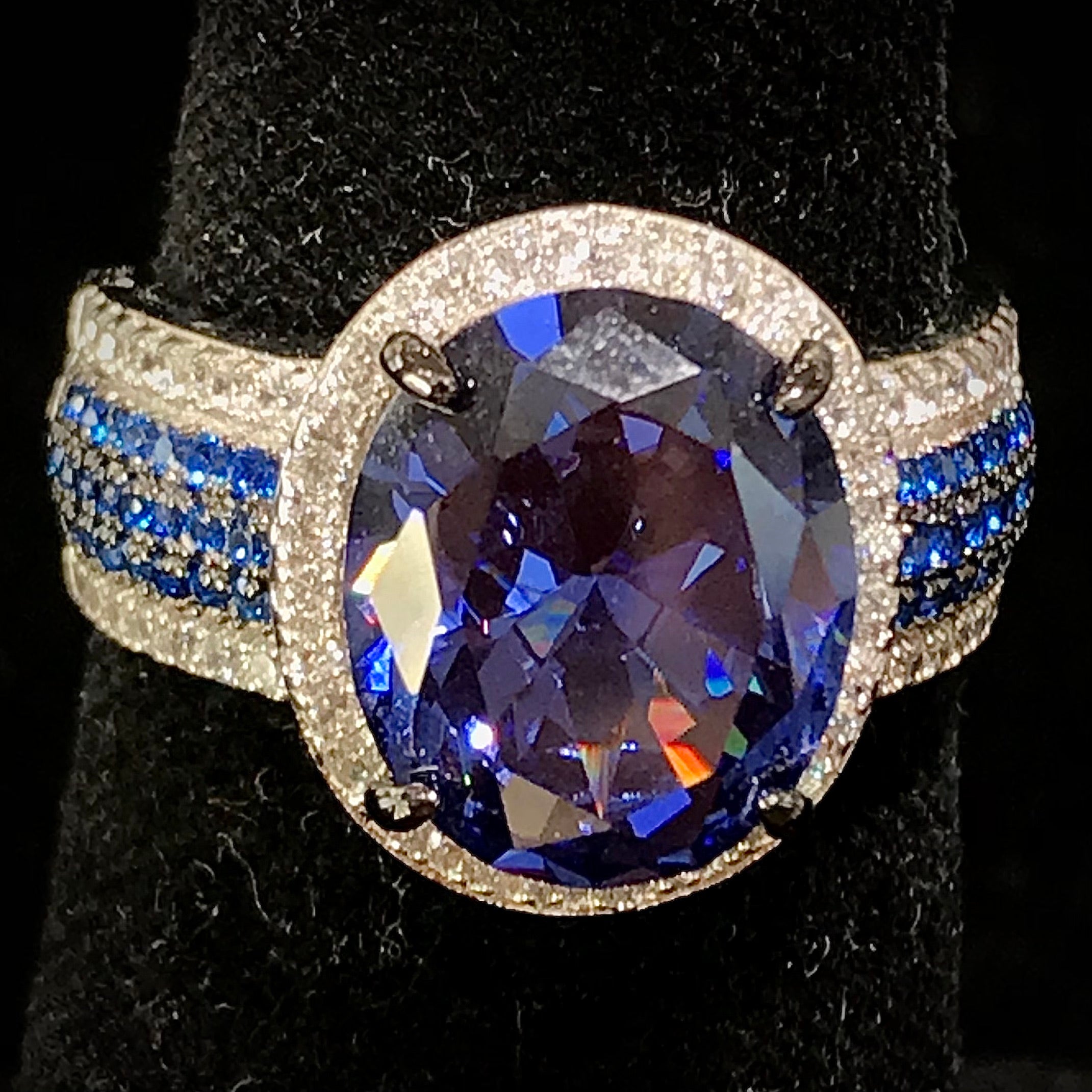 Sterling Silver Ring with Synthetic Blue Opal (Stone Size 18x10mm) and  Cubic Zirconia - Reflections Fine Jewelry