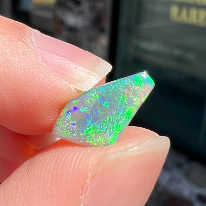 A loose, 1.27 carat Lightning Ridge crystal opal.  The opal has green colors.