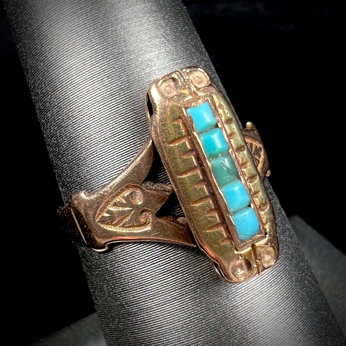 Antique yellow gold ring set with five square turquoise stones, circa 1920's.