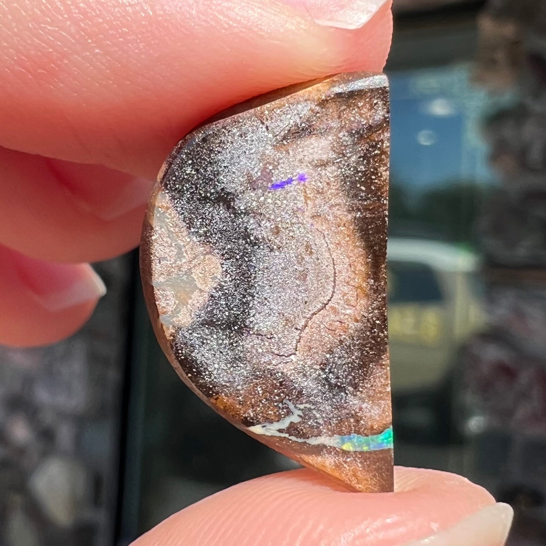 A loose ironstone boulder opal.