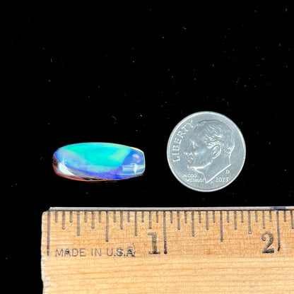 A 6.32ct Brazilian opal stone.  The opal has a green and blue rain pattern.