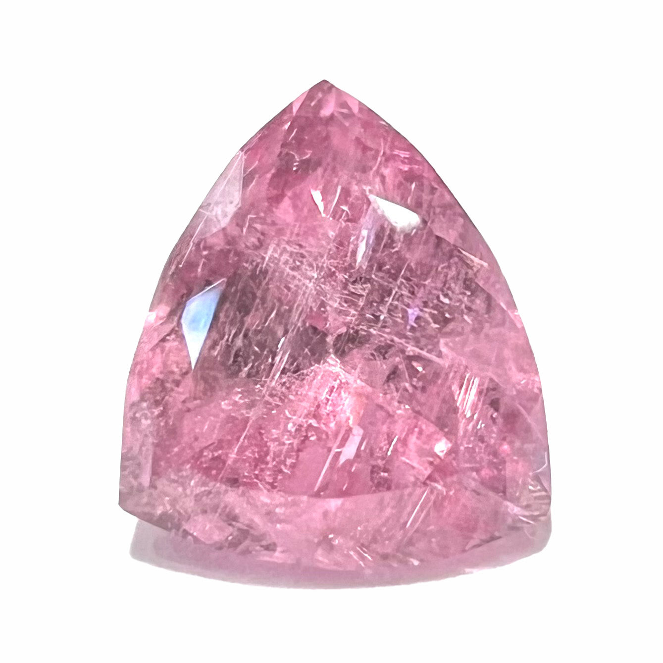 A loose, faceted trillion cut pink touramline gemstone.  The stone is a light bubblegum pink color.