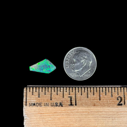 A loose, 1.27 carat Lightning Ridge crystal opal.  The opal has green colors.