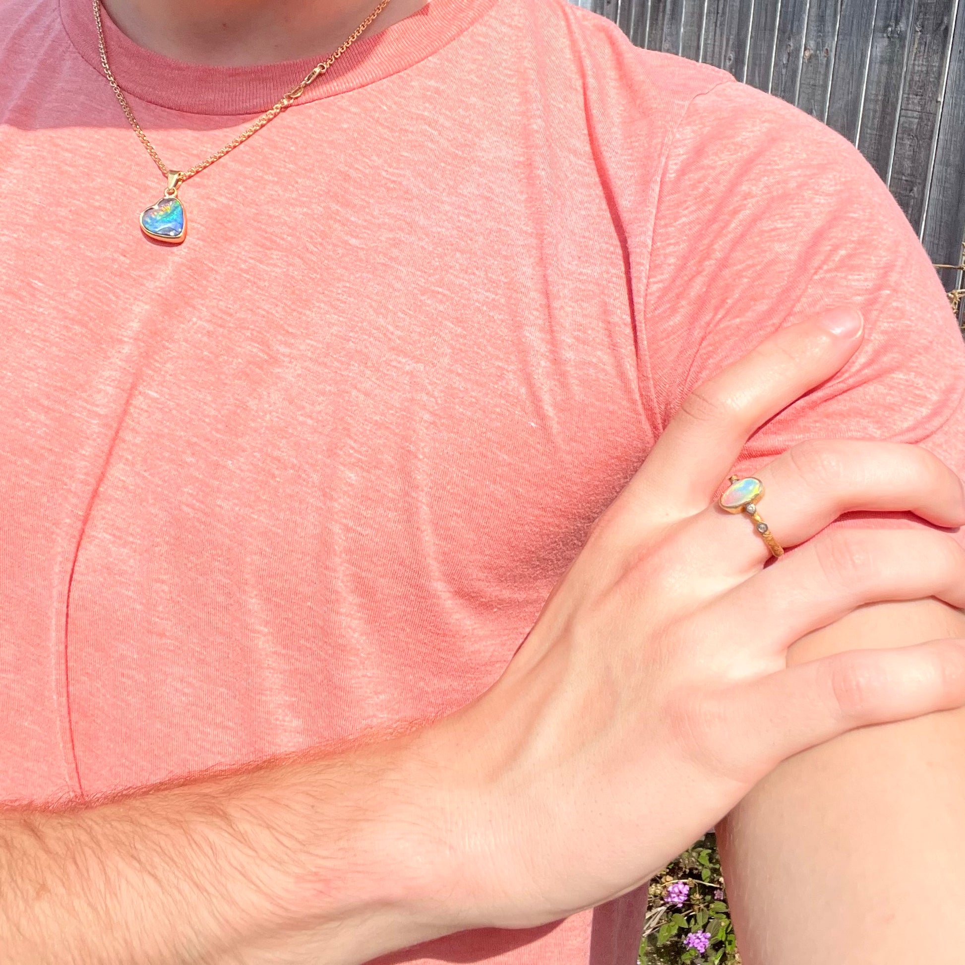 A yellow gold plated sterling silver ring mounted with an Ethiopian fire opal and rose cut diamond accents.