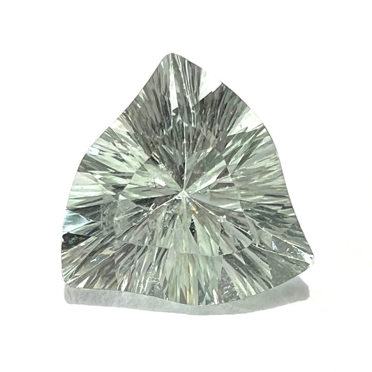 A loose, triangular fantasy cut prasiolite gemstone.  Prasiolite is a light green variety of quartz.