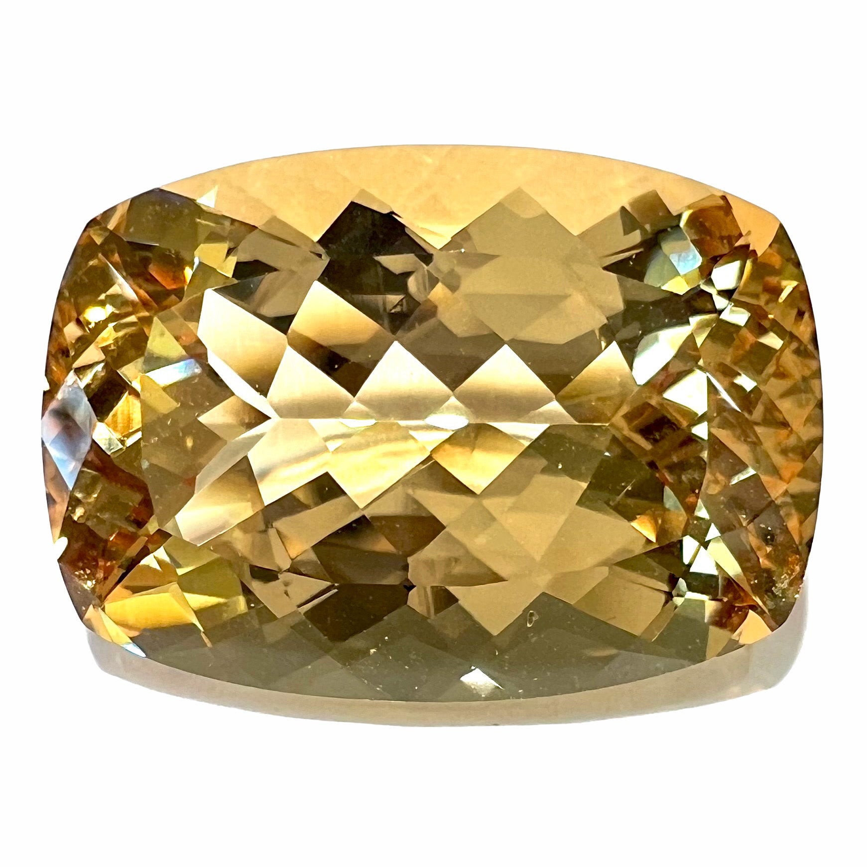 A loose, elongated cushion cut golden beryl stone gemstone.  The stone weighs 19.05 carats.