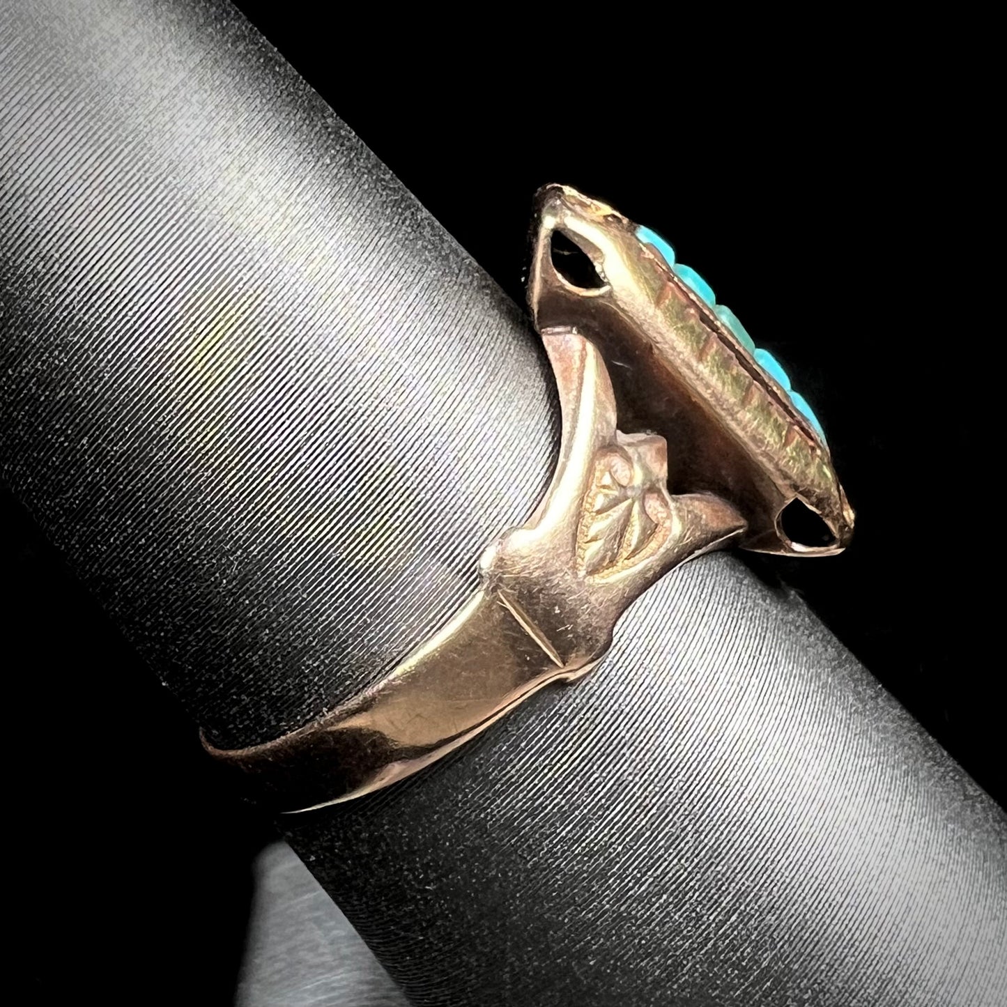 Antique yellow gold ring set with five square turquoise stones, circa 1920's.