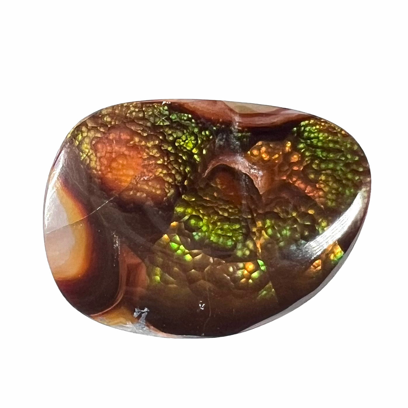 A large Mexican fire agate cabochon.  The stone has a bubbly green pattern.