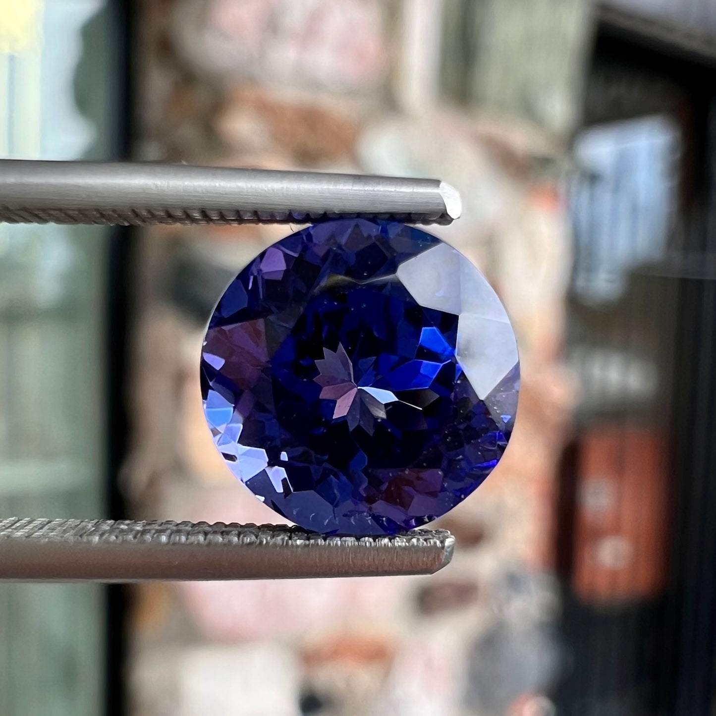 A loose, AAA grade, deep blue, round brilliant cut tanzanite stone.