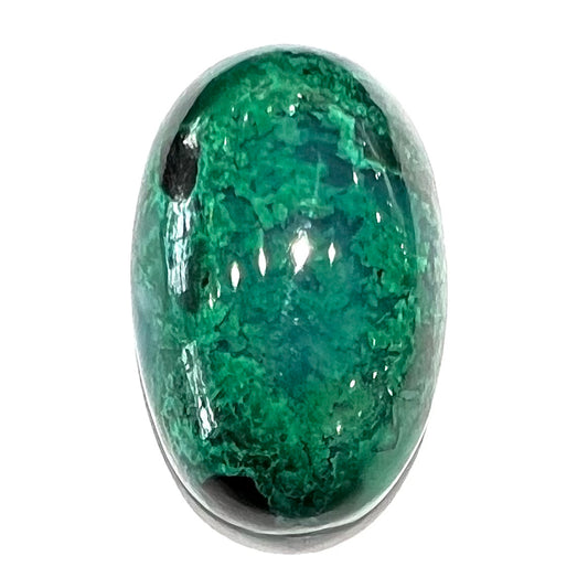 A loose, oval cabochon cut maw sit sit jade stone.