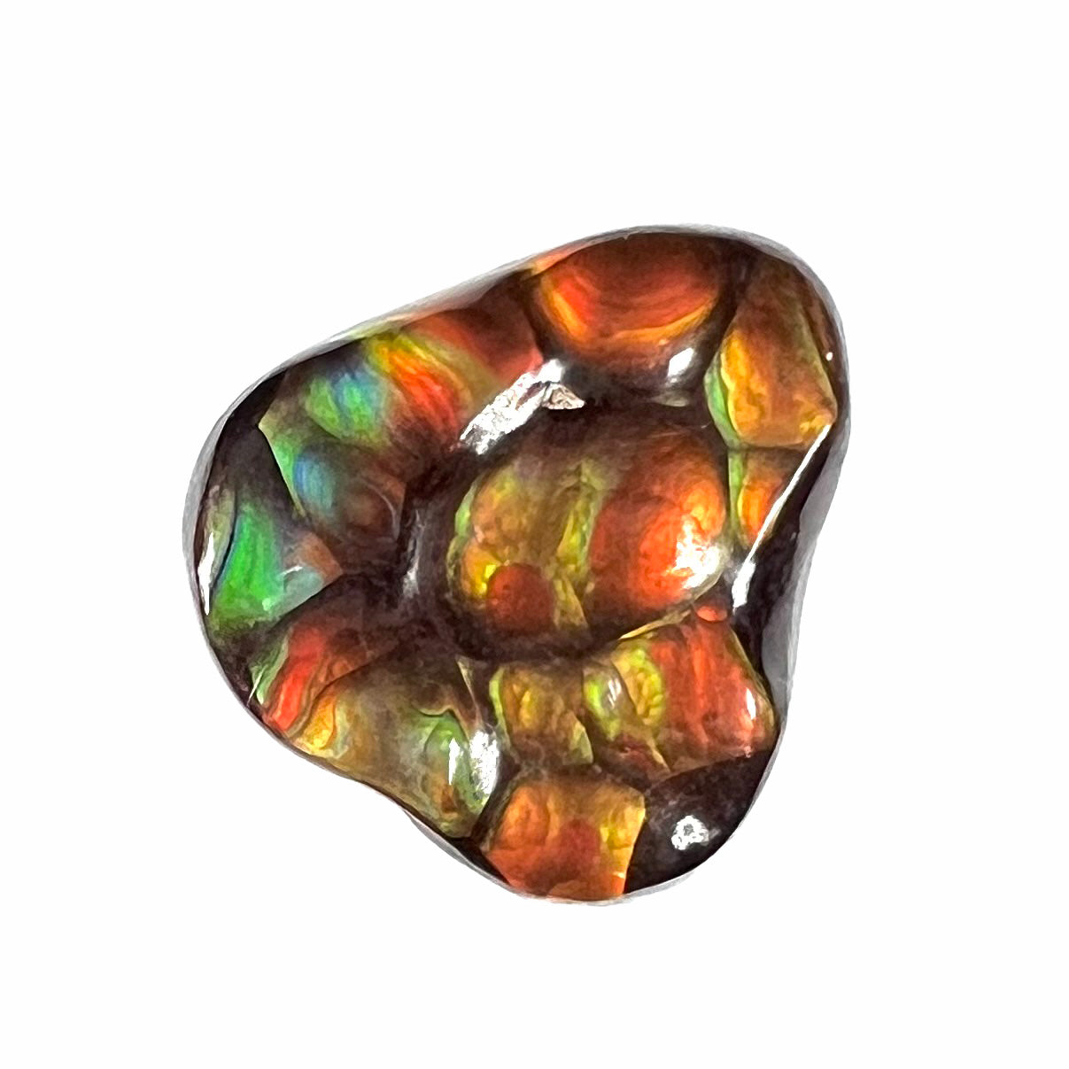 A freeform shaped Mexican fire agate stone.  The stone is red with yellow banding.