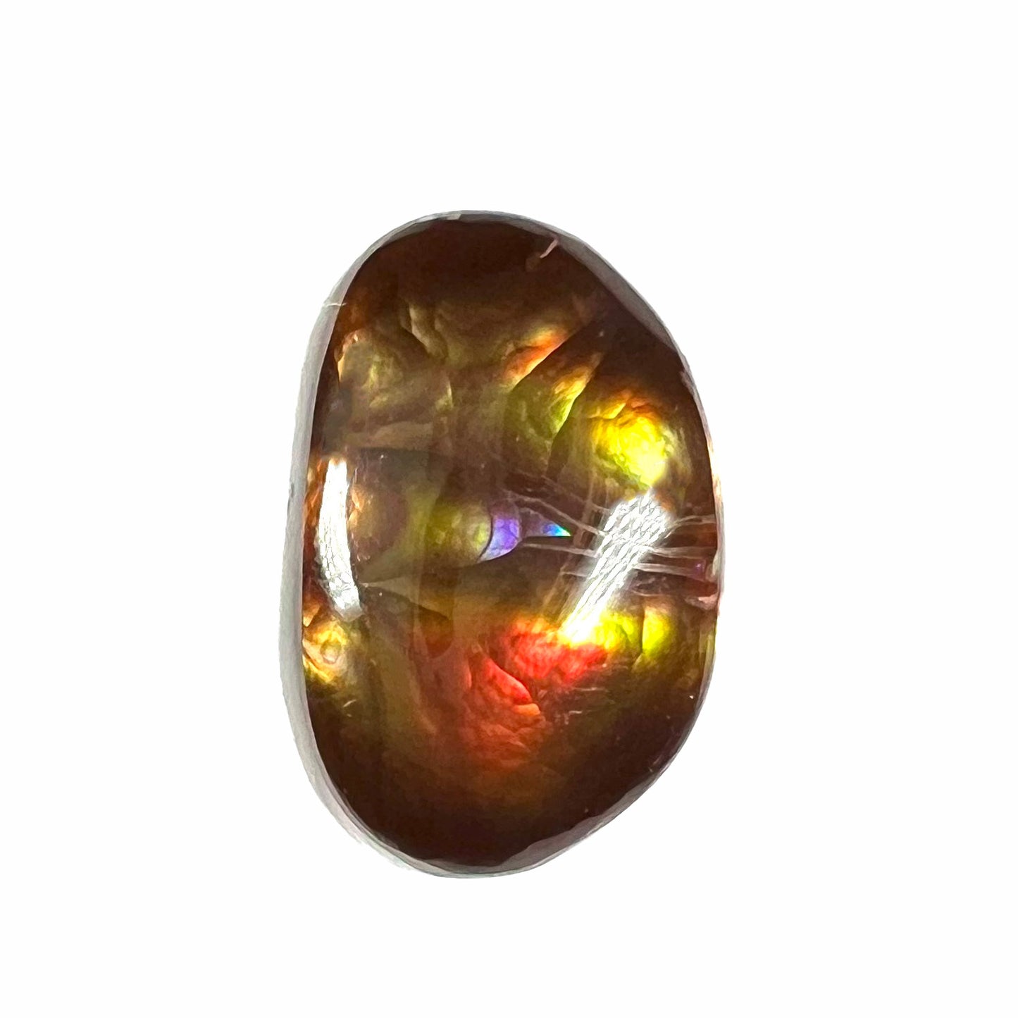 A loose Mexican fire agate cabochon.  The stone has a bright purple and blue iris pattern.