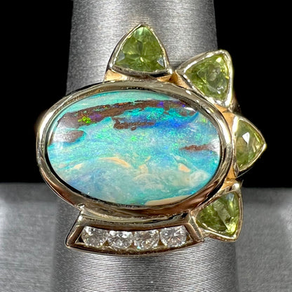 Dina | Custom Opalized Wood & Peridot Ring in 14kt Gold