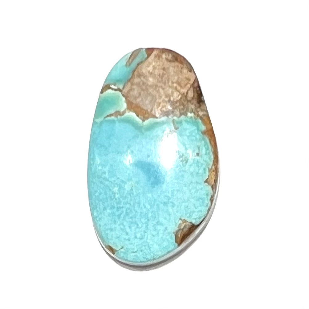 A light blue turquoise stone with brown matrix from Pilot Mountain Mine, Nevada.