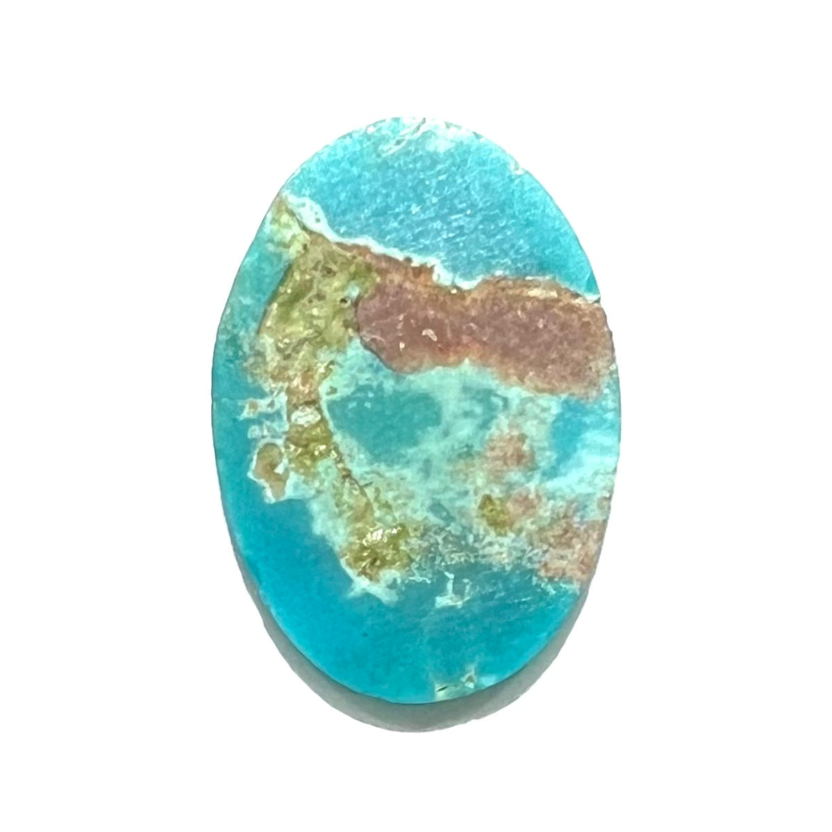 An electric blue Pilot Mountain turquosie stone from Nevada.  The turquoise is cut into an oval shaped cabochon.