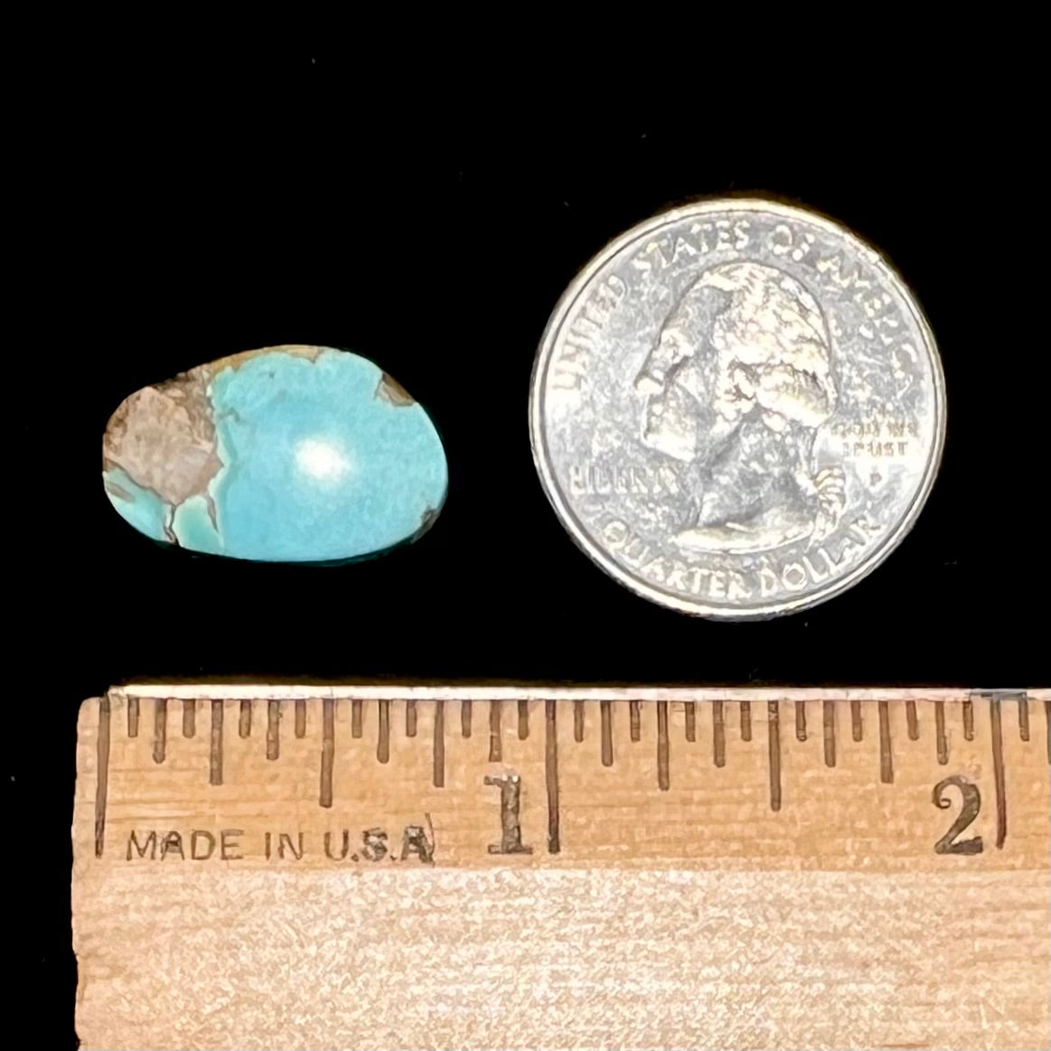 A light blue turquoise stone with brown matrix from Pilot Mountain Mine, Nevada.