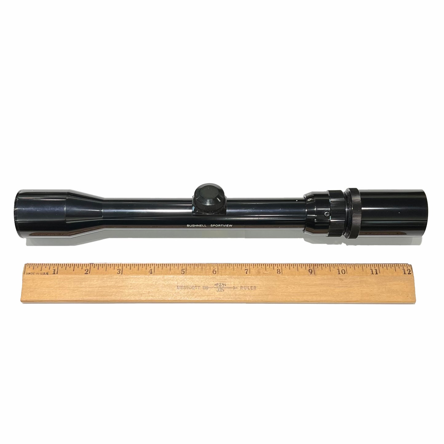 A 3x - 9x zoom, Sportview model rifle scope, manufactured by Bushnell.