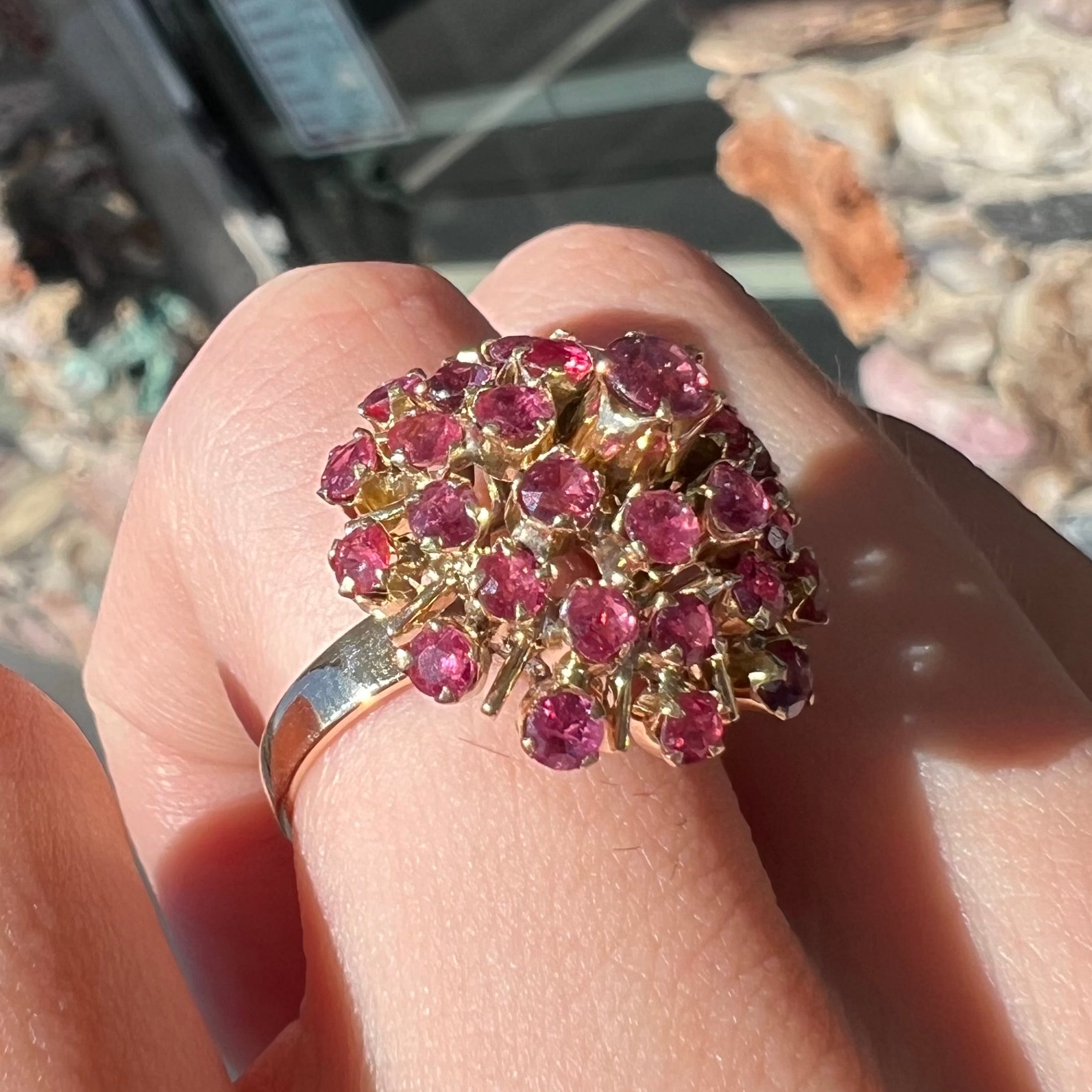 A ladies' vintage Thai princess ring set with round cut purplish red rubies.