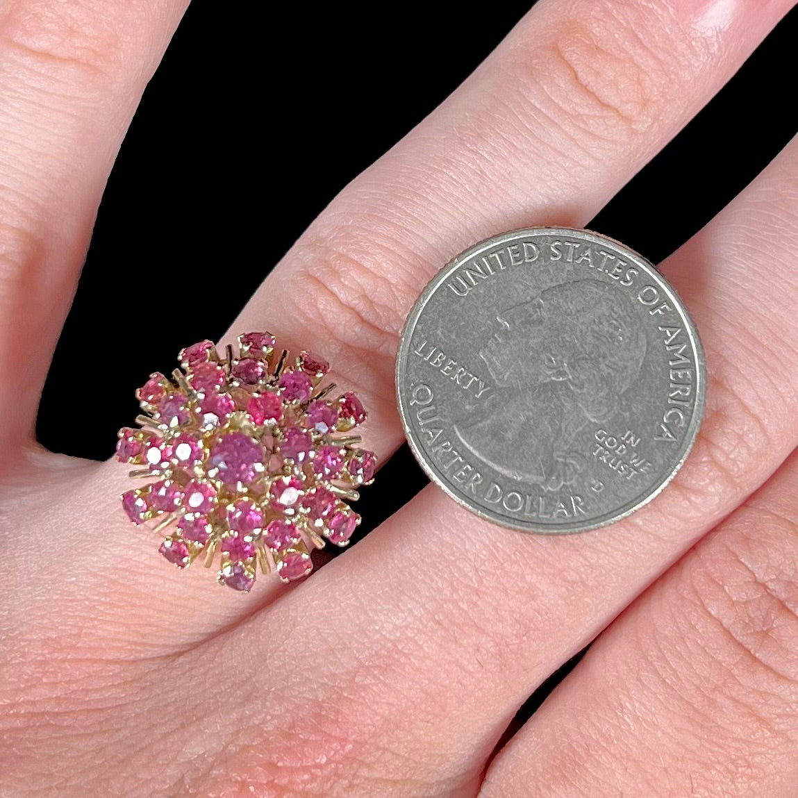 A ladies' vintage Thai princess ring set with round cut purplish red rubies.