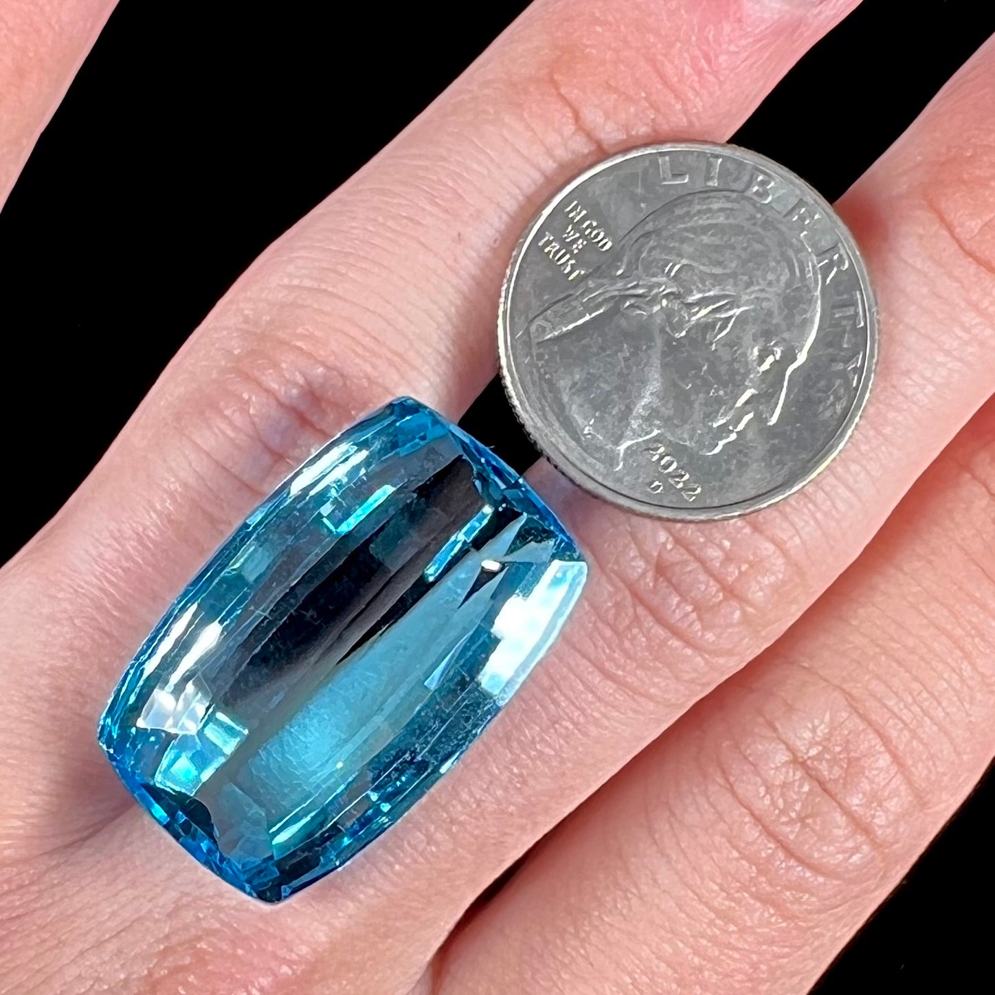 A large, loose Swiss blue topaz gemstone.