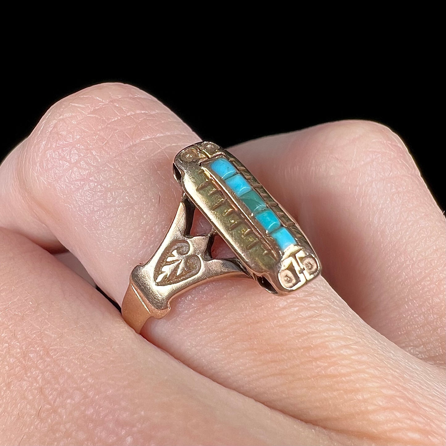 Antique yellow gold ring set with five square turquoise stones, circa 1920's.