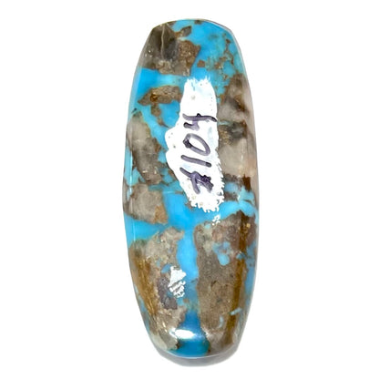 A loose, barrel cabochon cut turquoise stone from the Courtland-Gleeson mine.