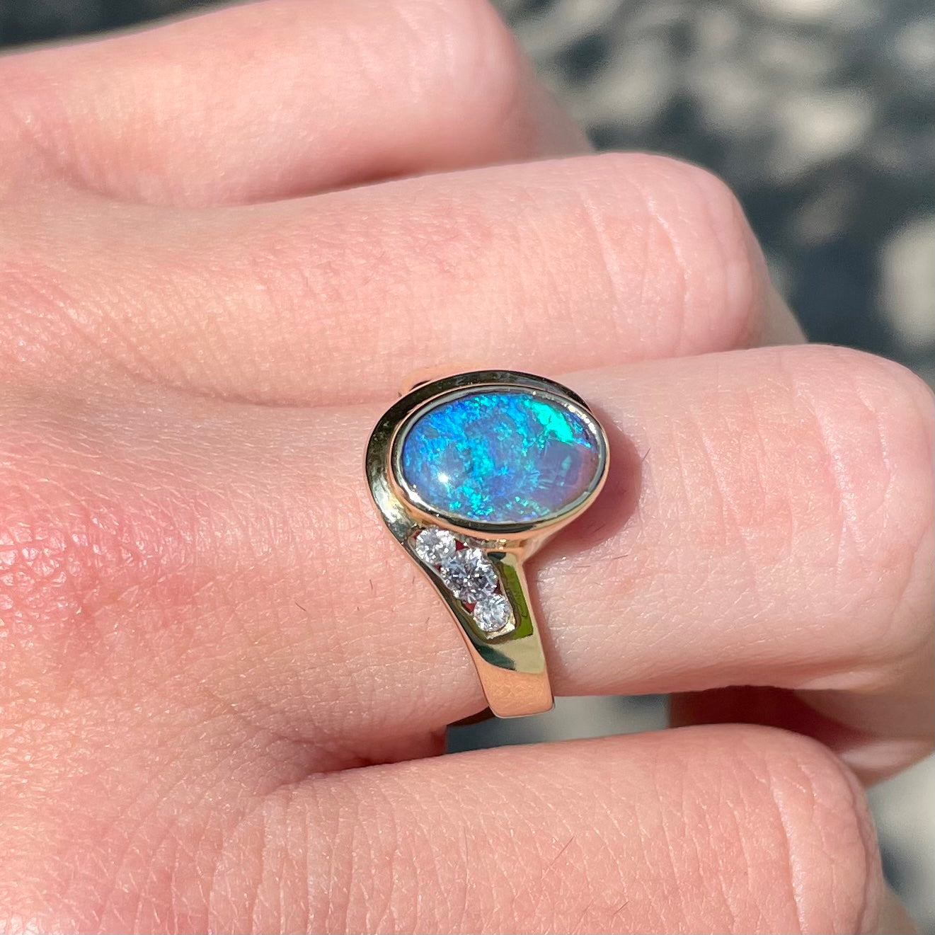 Solid black store opal ring