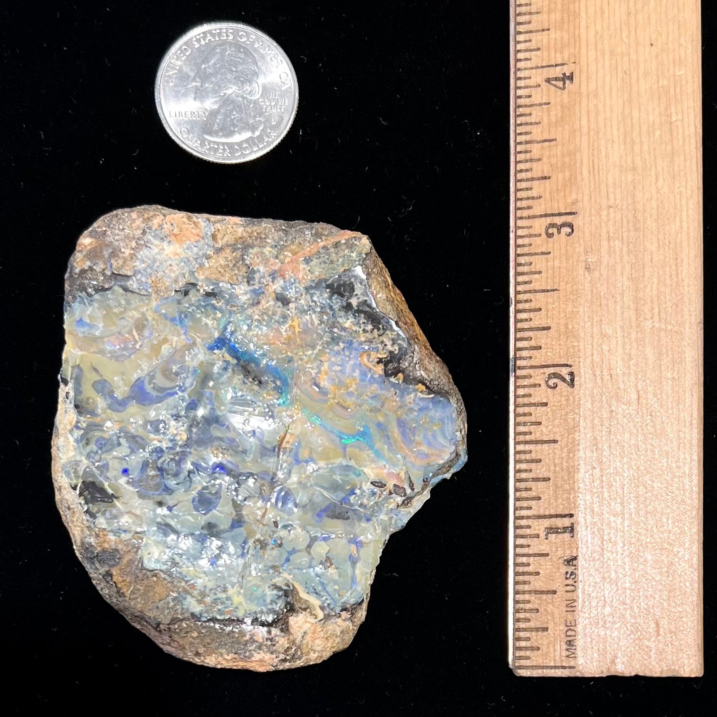 A rough specimen of boulder opal from Quilpie, Australia.