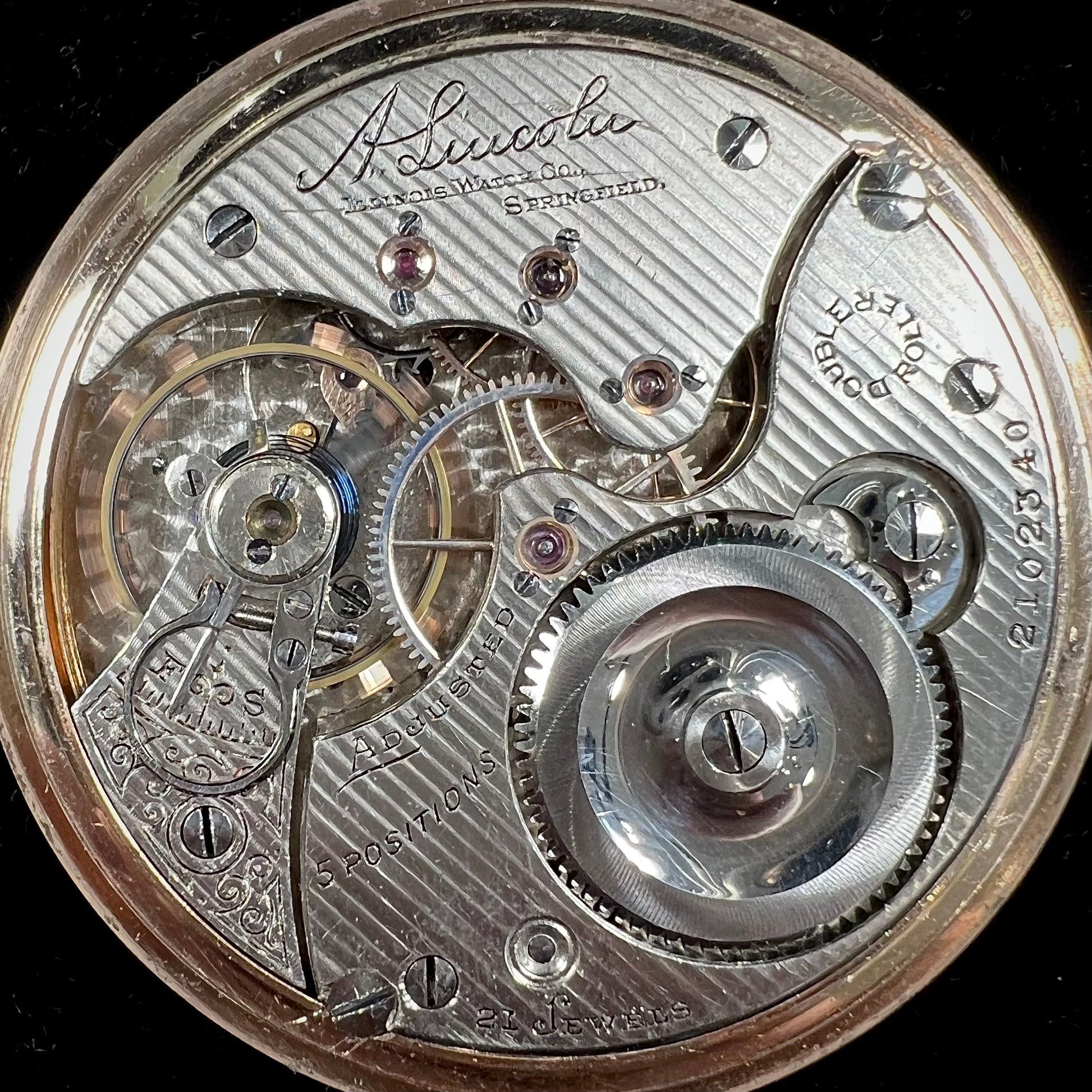 A gold filled, railroad grade pocket watch with an Illinois face and an A. Lincoln movement.