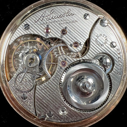 A gold filled, railroad grade pocket watch with an Illinois face and an A. Lincoln movement.