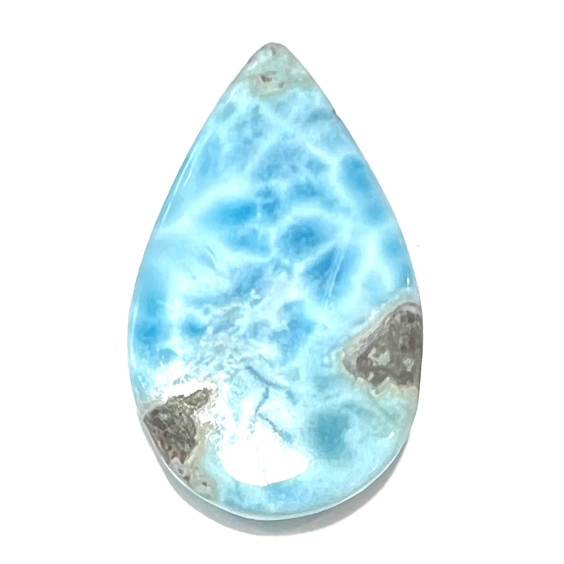 A loose, pear shaped larimar cabochon from Dominican Republic.  The stone is AAA+ grade.