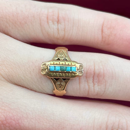 Antique yellow gold ring set with five square turquoise stones, circa 1920's.