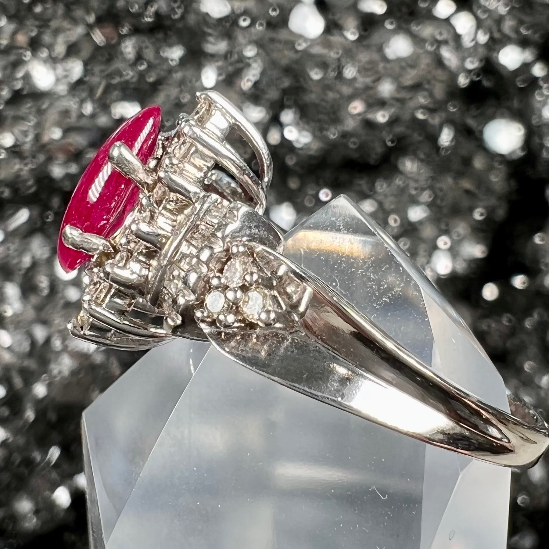 A vintage style white gold marquise cabochon cut ruby and diamond ring.