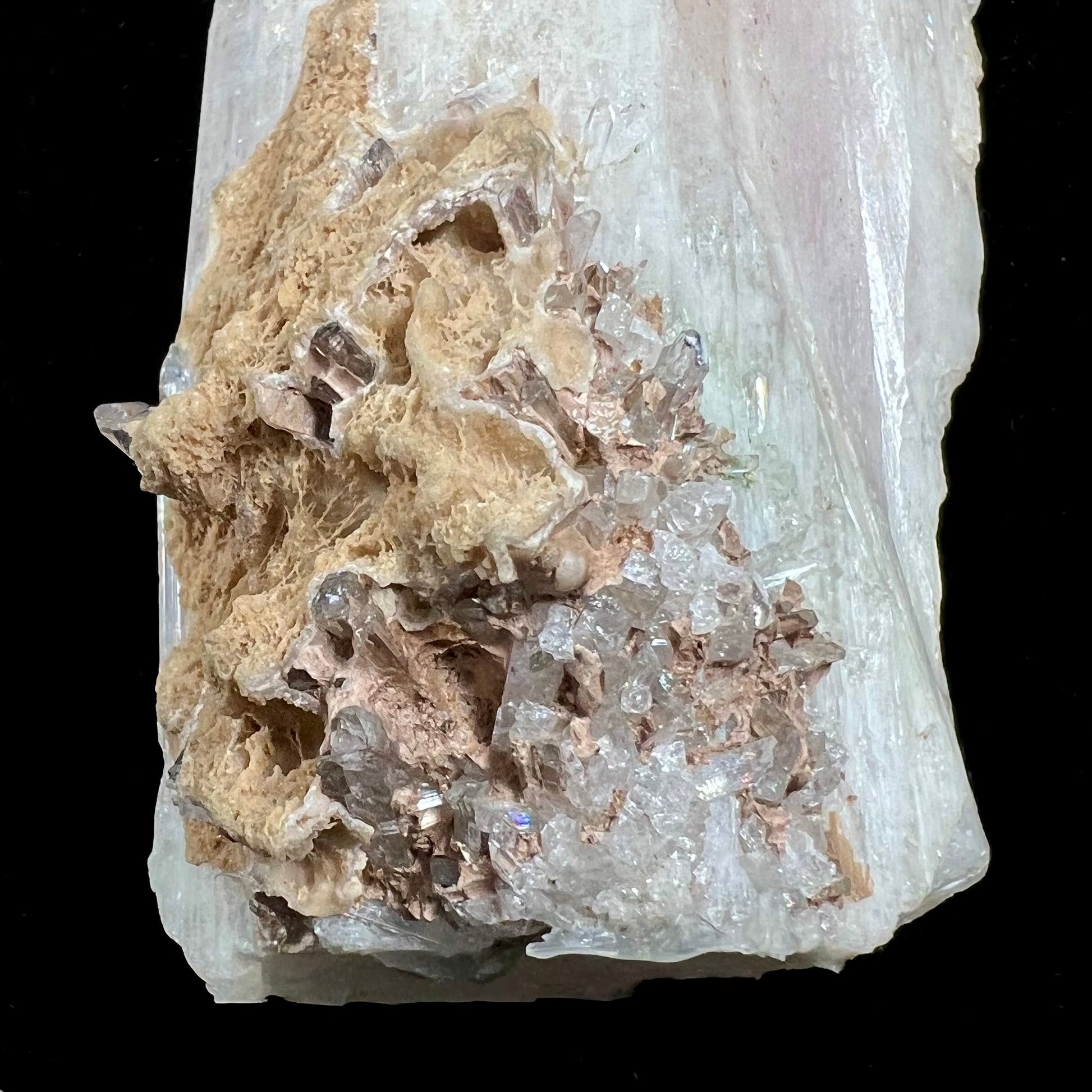 A 5.5 inch long pink danburite crystal that weighs over one pound.