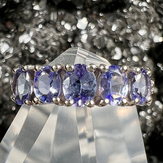 A sterling silver five stone oval cut tanzanite ring.