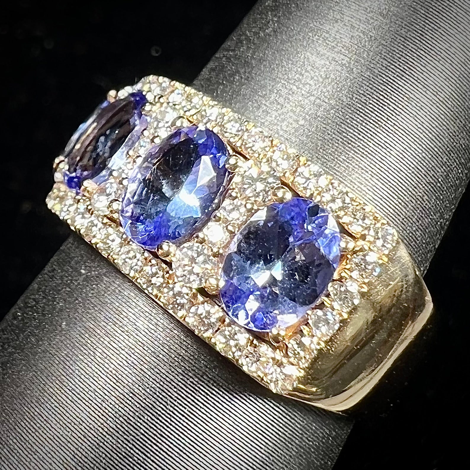 Gold 5 tanzanite and diamond chips store ring