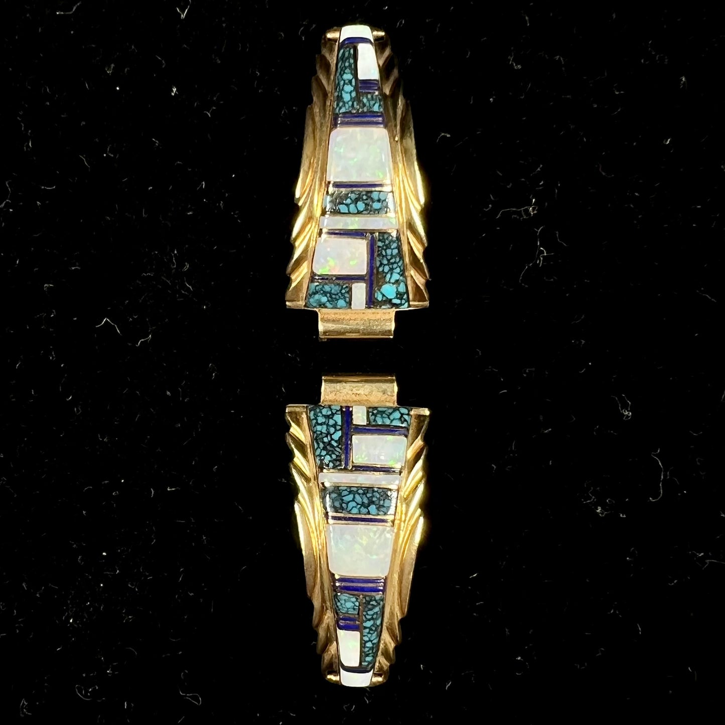 A pair of ladies' yellow gold watch cuffs inlaid with spiderweb turquoise and white crystal opal.