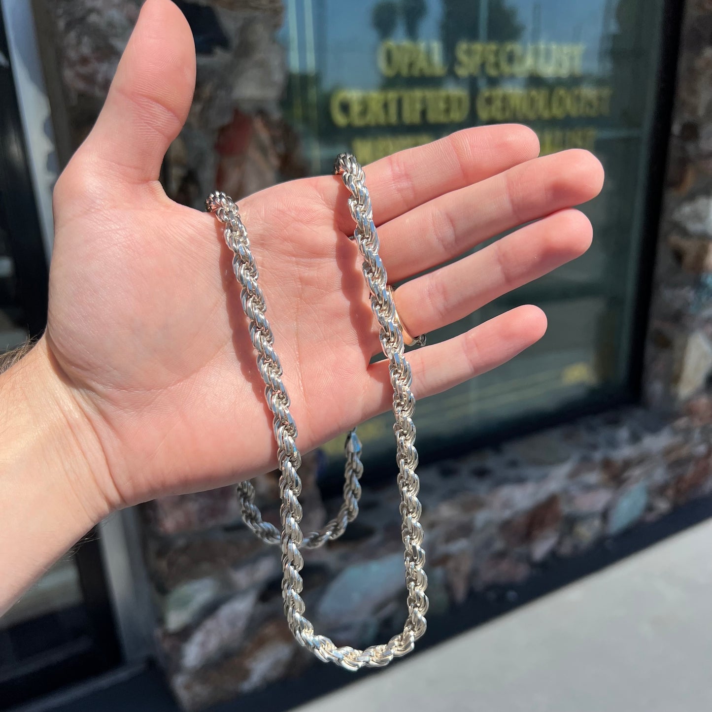 A men's 26 inch sterling silver rope chain.  The chain is stamped "925 ITALY."