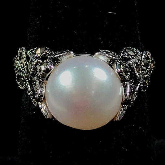 Fresh water pearl ring set in a unique sterling silver cast setting with marcasite.