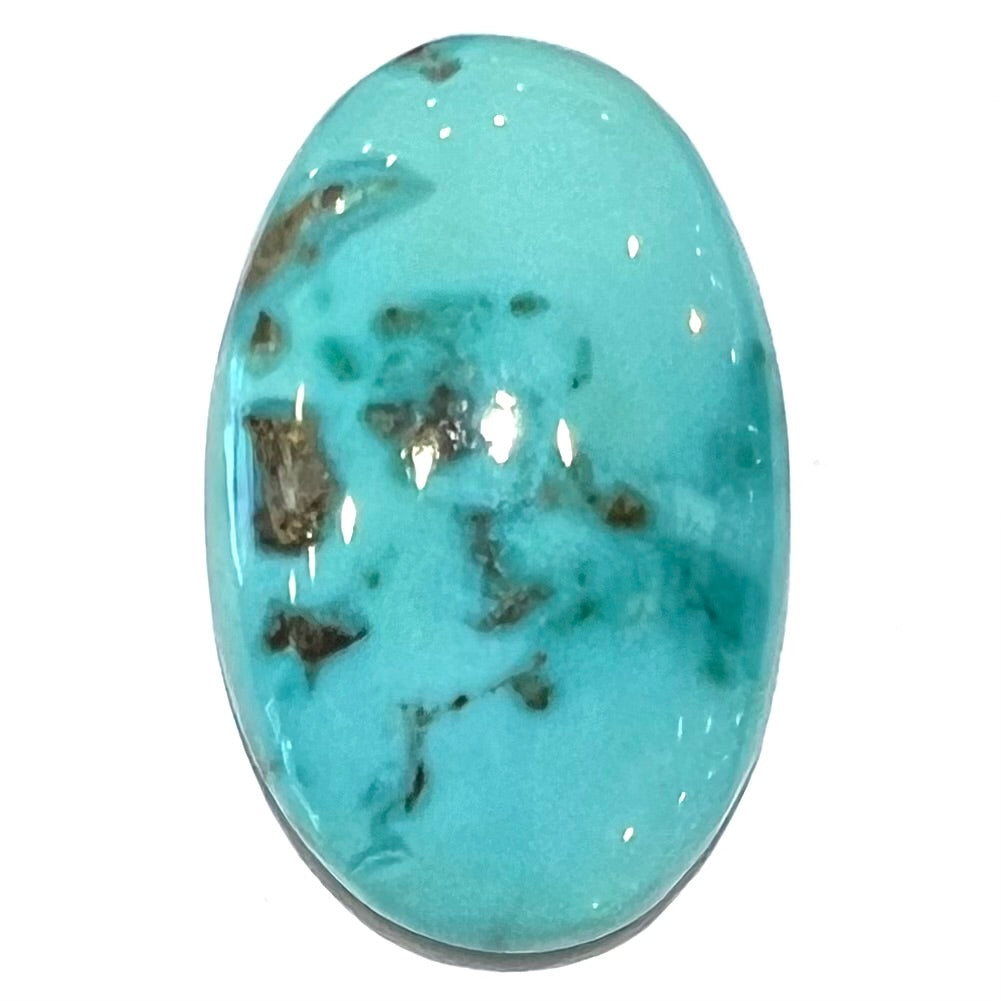 Loose oval cabochon cut turquoise stone from Pilot Mountain Mine, Nevada.