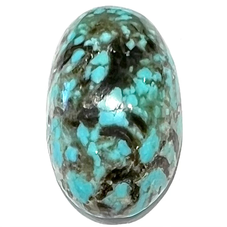 A loose, oval cabochon cut turquoise stone from Valley Blue Mine in Lander County, Nevada.