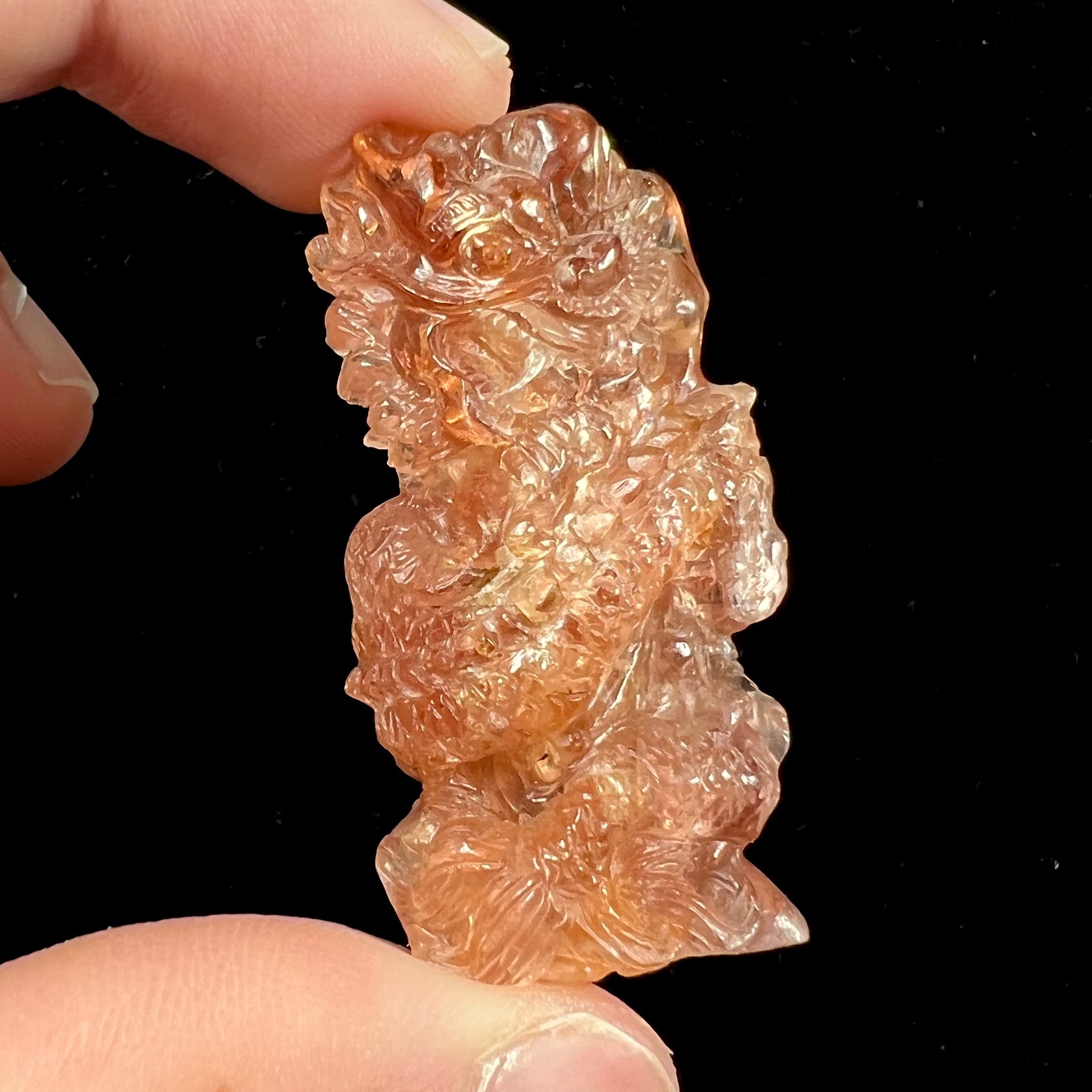 Imperial Topaz Crystal Dragon Carving, 145.26cts | Burton's