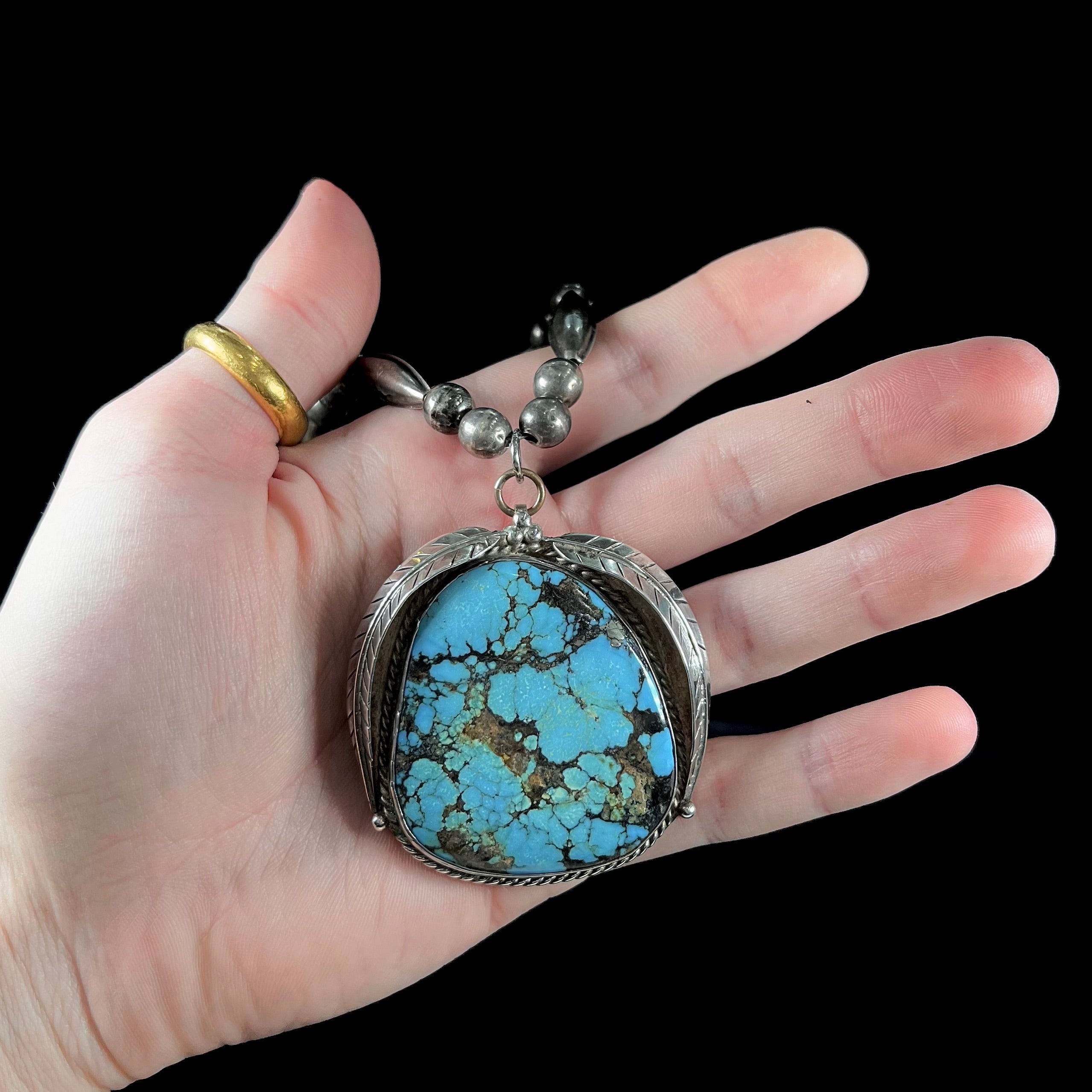 Store Southwestern SS Spiderweb Turquoise Pendant