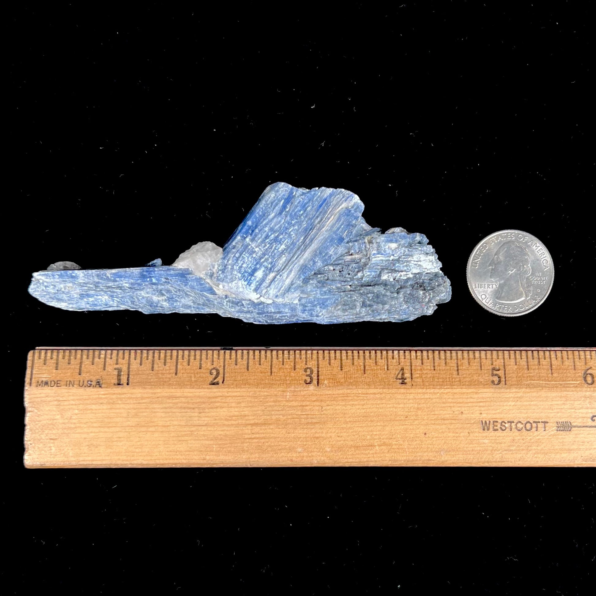 A twinned blue kyanite crystal specimen that measures 4.25 inches.