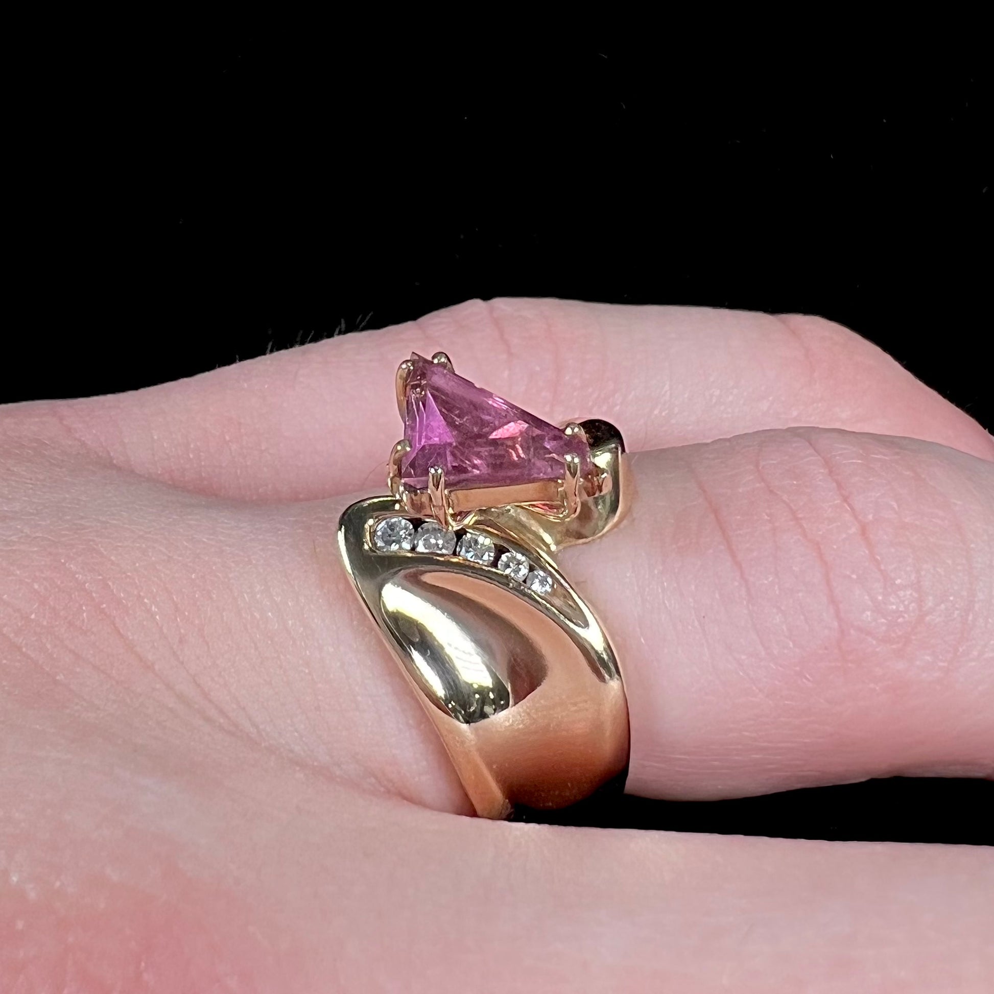 An estate yellow gold and diamond triangle cut Pala pink tourmaline ladies' ring.