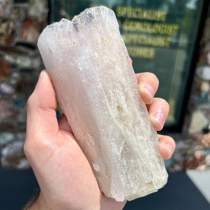 A 5.5 inch long pink danburite crystal that weighs over one pound.