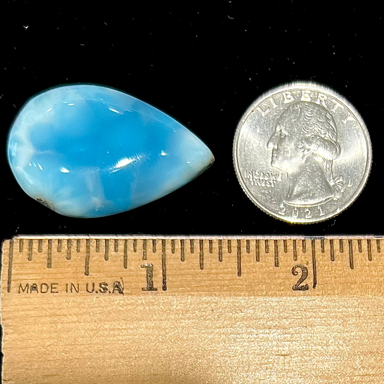 A loose, pear shaped larimar cabochon from Dominican Republic.  The stone is AAA+ grade.