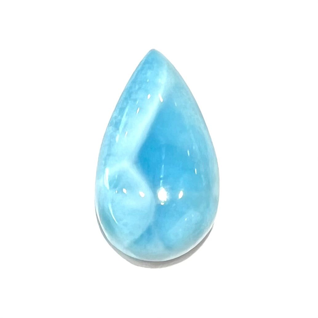 A loose, pear shaped, cabochon cut larimar stone from Dominican Republic.