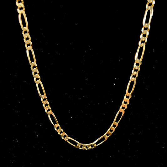 A 14k yellow gold men's figaro chain.